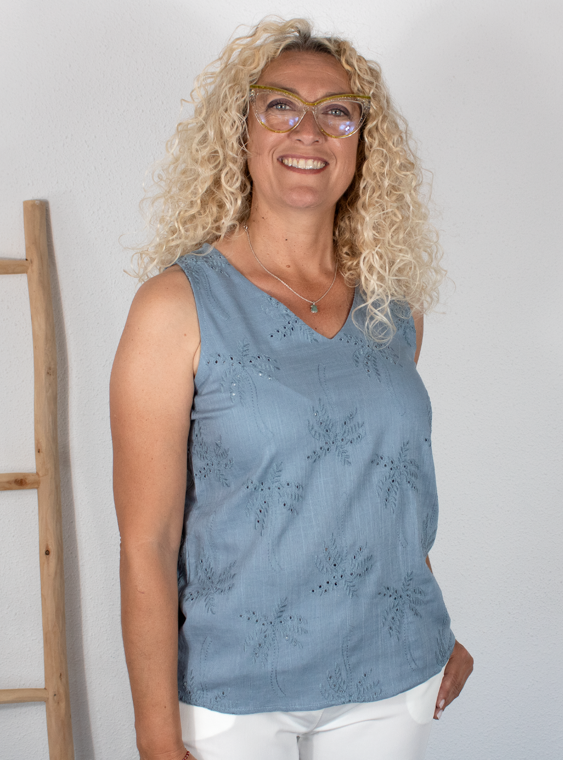 Blusa celeste palmeras