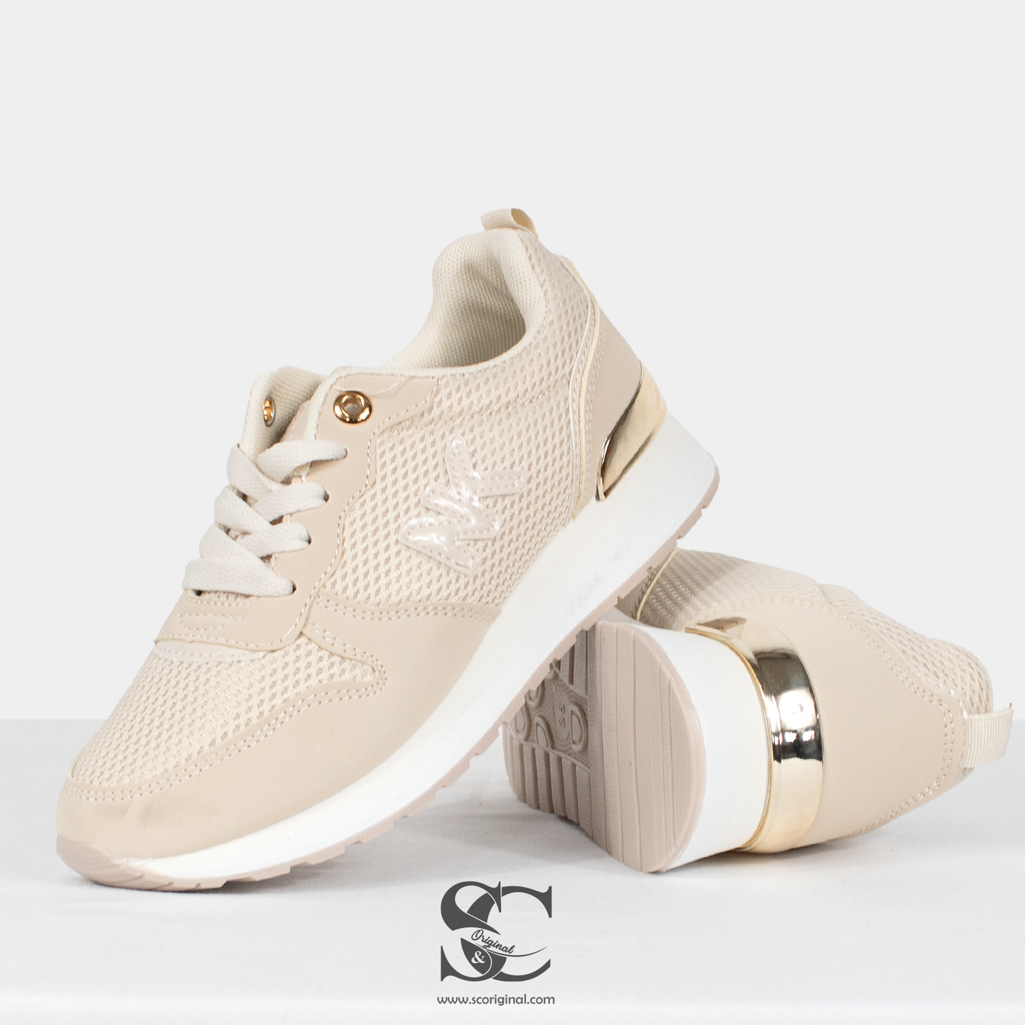 Zapatilla deportiva mujer modelo "NK" dorada