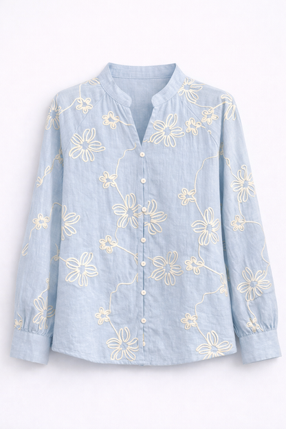 Blusa blanca con flores bordadas