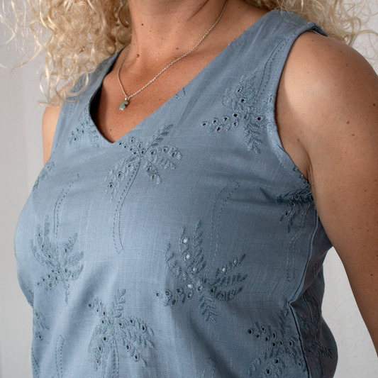 Blusa celeste palmeras