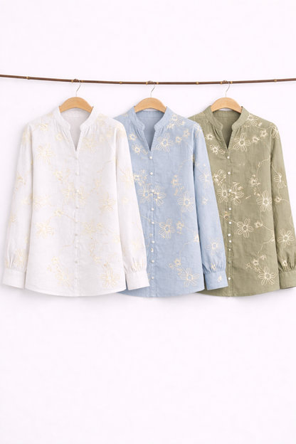 Blusa blanca con flores bordadas