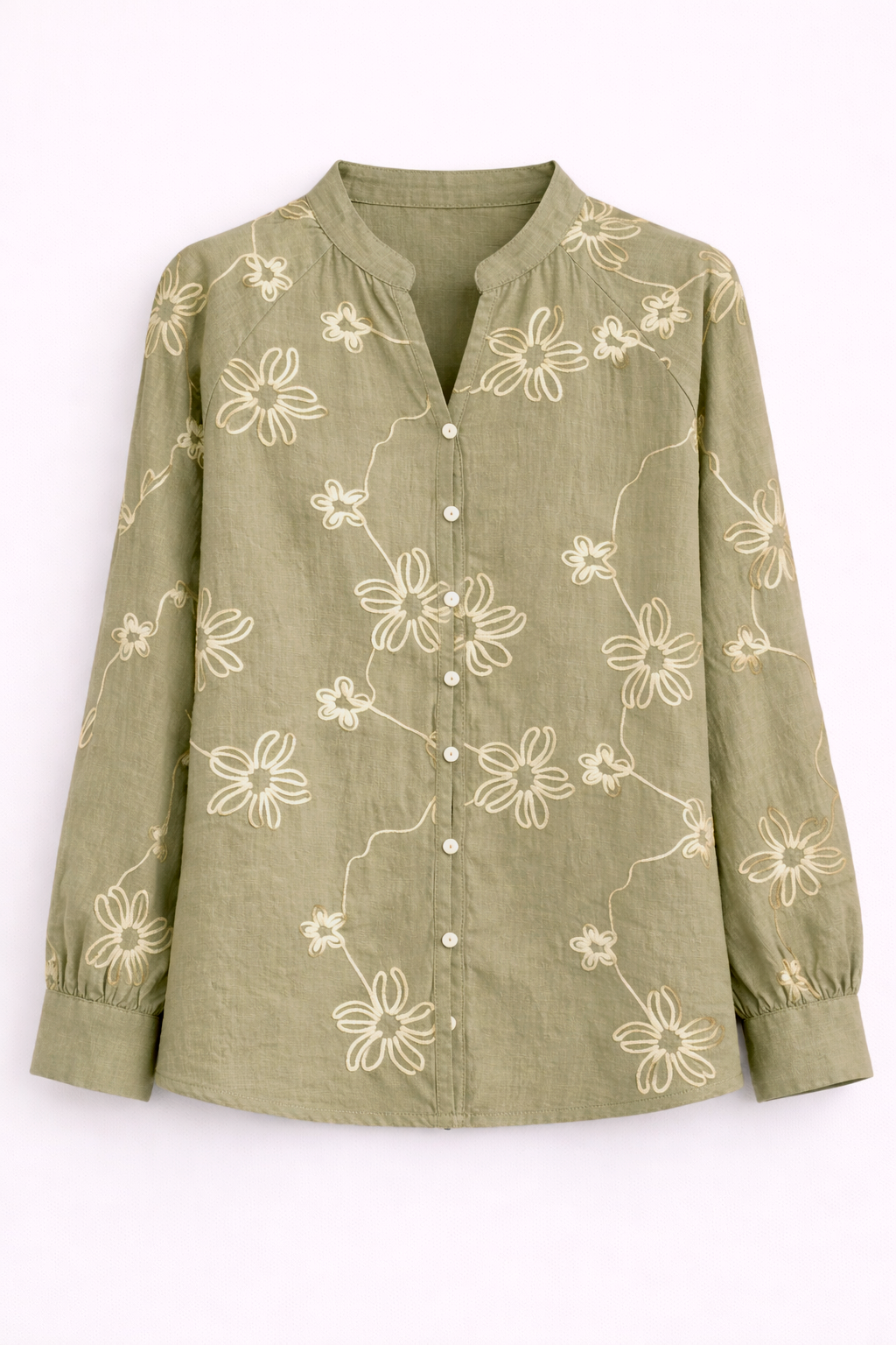 Blusa blanca con flores bordadas