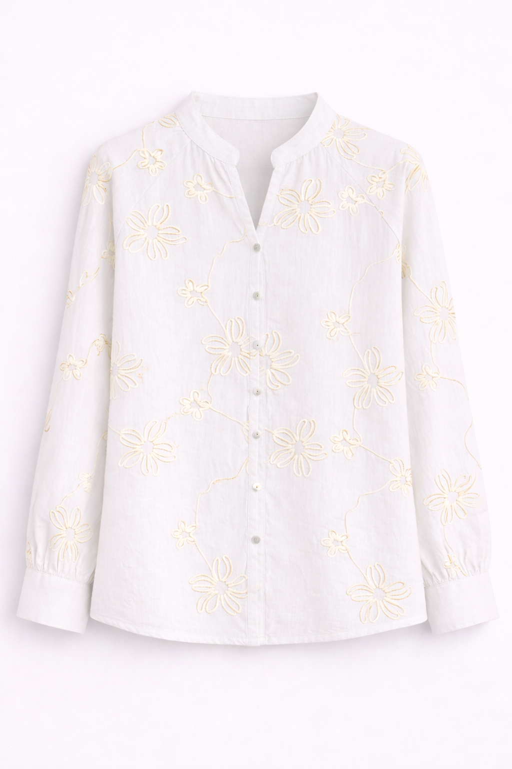 Blusa blanca con flores bordadas