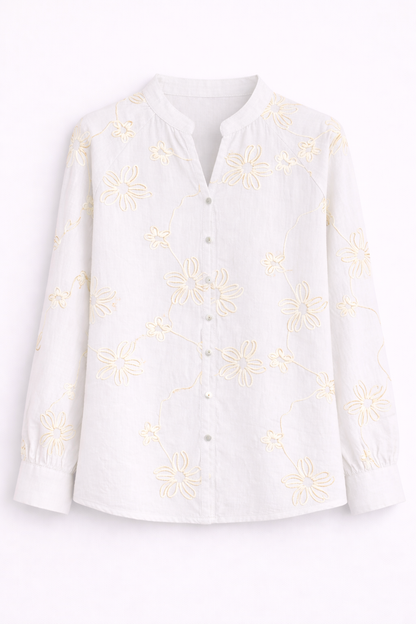 Blusa blanca con flores bordadas
