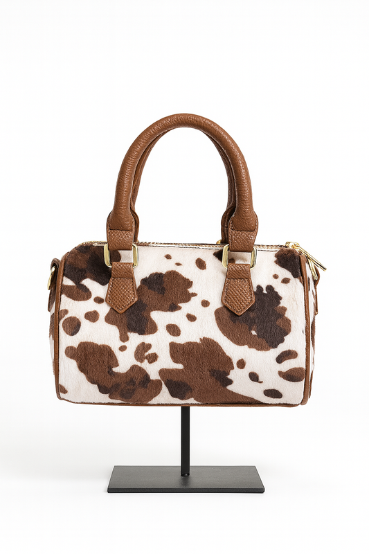 Bolso bowling animal print vaca en marrón y rosa